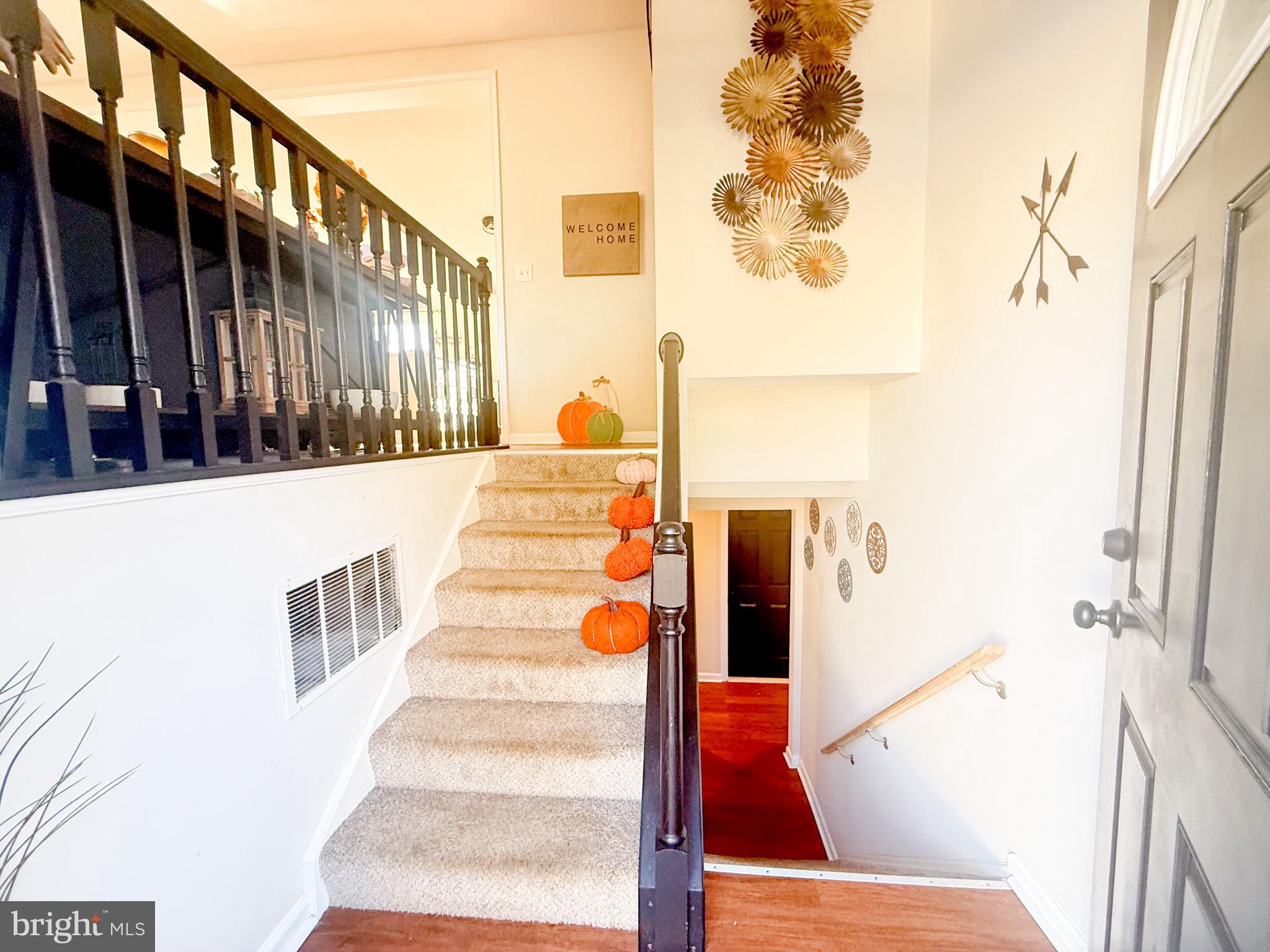 77 Martin Road Conowingo, MD 21918 - Photo 2 of 24 a view of staircase with railing and white walls