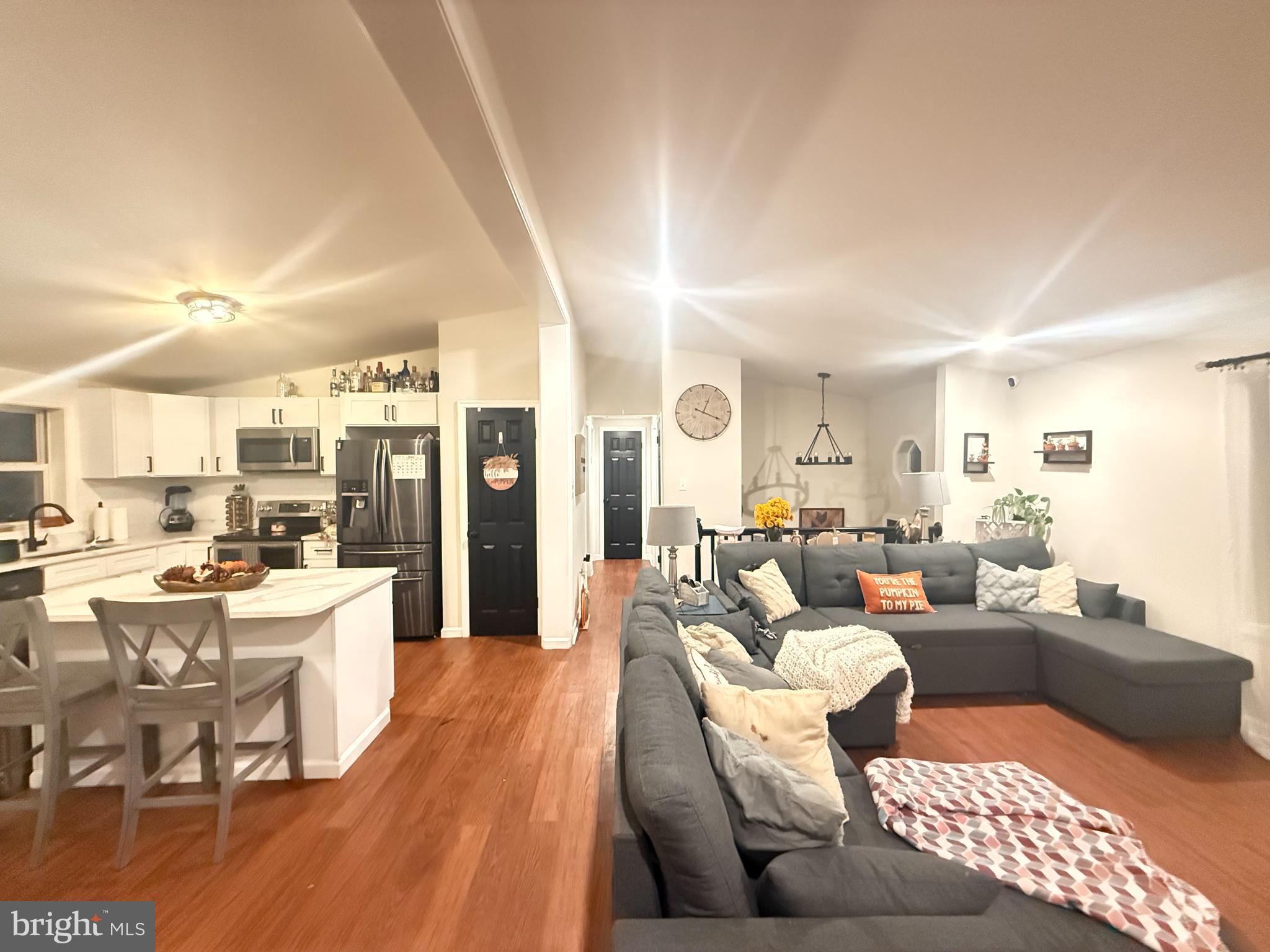 77 Martin Road Conowingo, MD 21918 - Photo 7 of 24 a living room with lots of furniture and view of kitchen