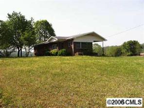355 Russell Road Polkton, NC 28135 - Photo 1 of 3 a view of a house with a yard