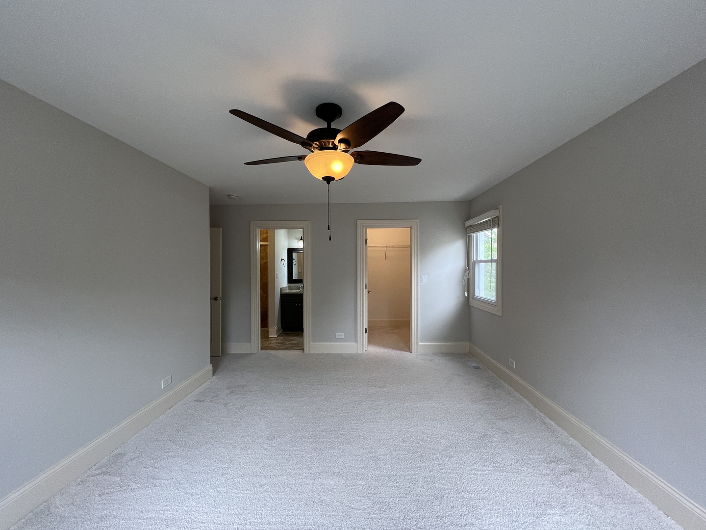 1108 Devonshire Road Buffalo Grove, IL 60089 - Photo 14 of 22 a view of an empty room with a window