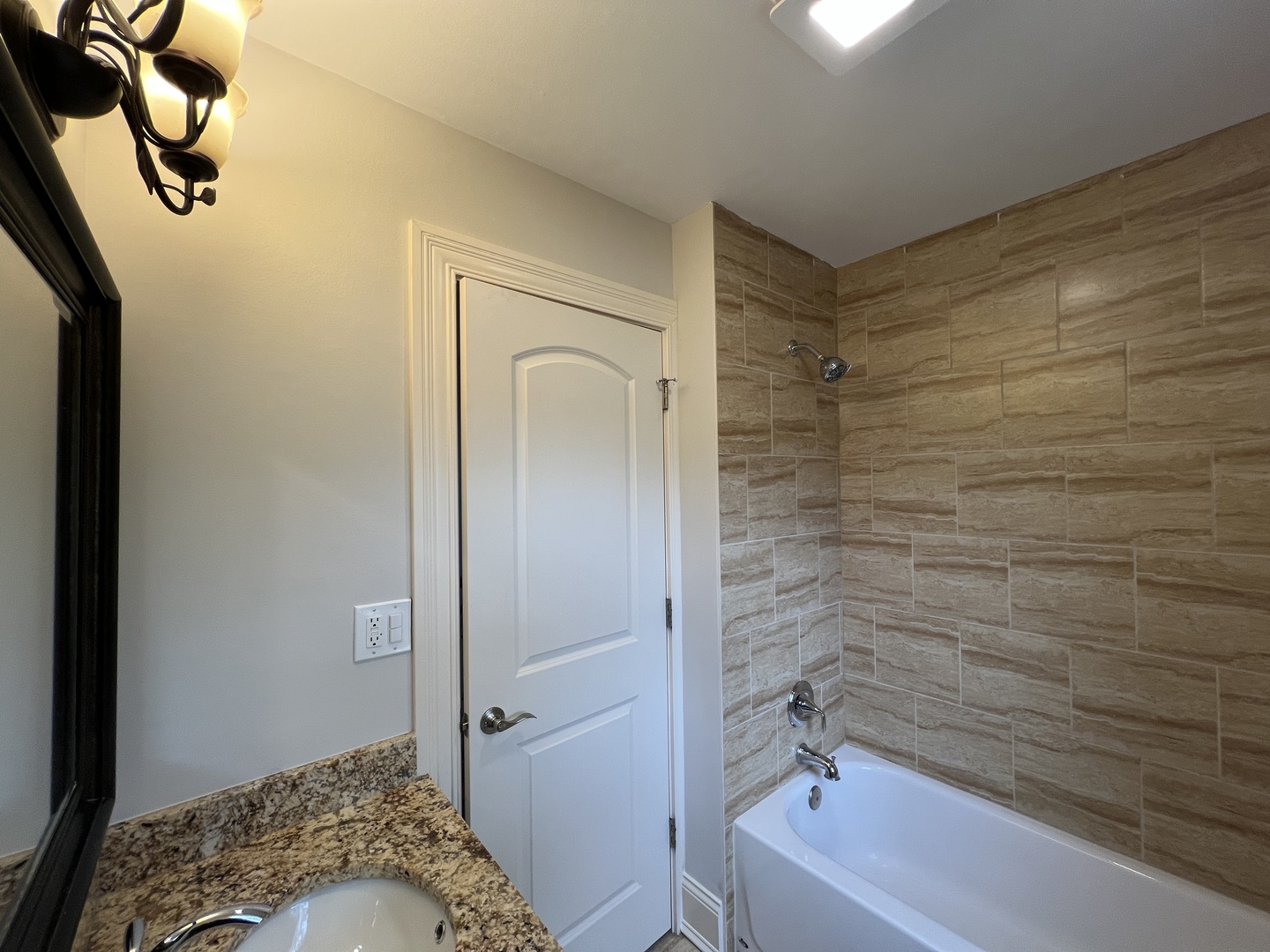 1108 Devonshire Road Buffalo Grove, IL 60089 - Photo 20 of 22 a bathroom with a bathtub and shower