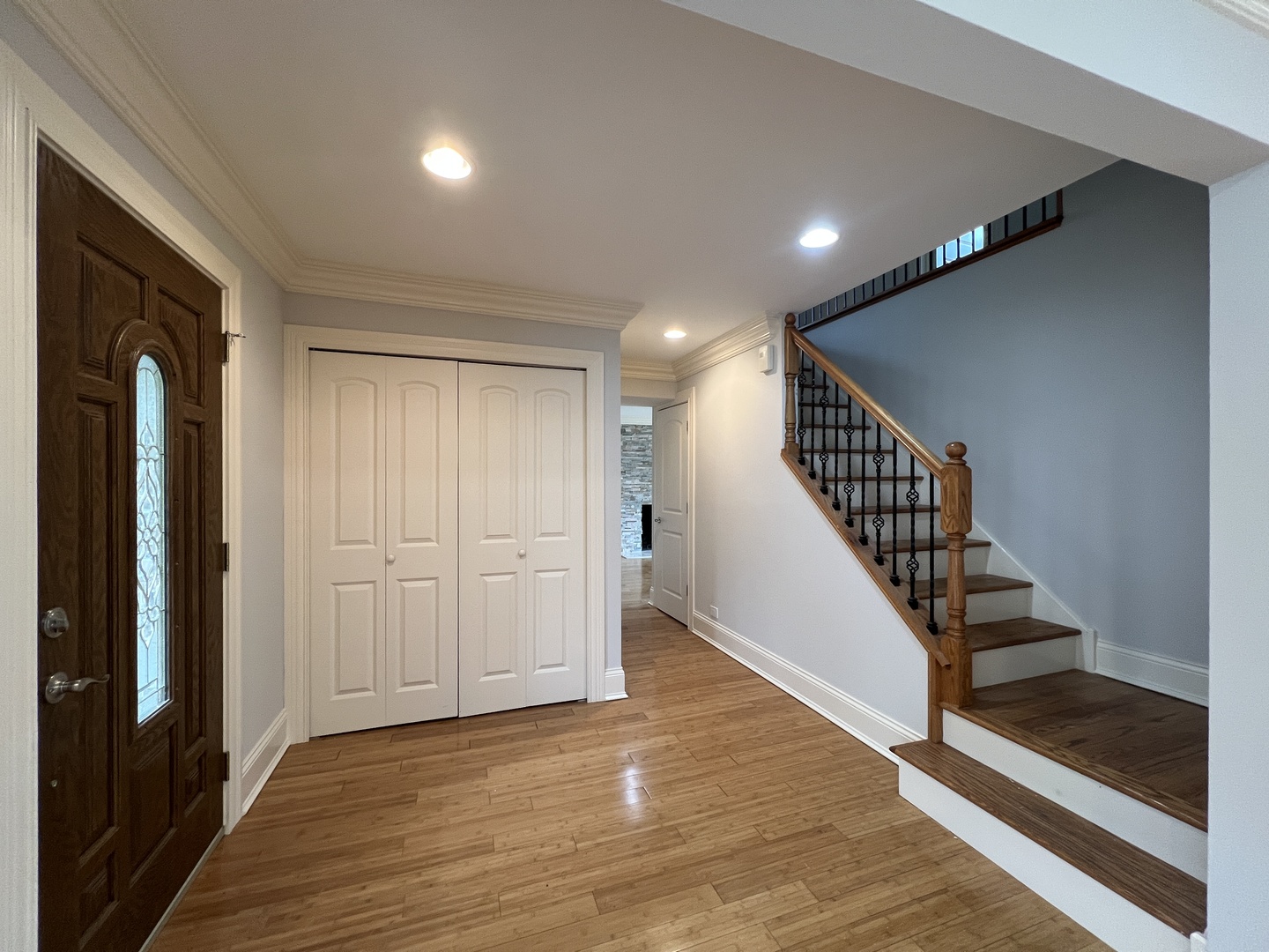 1108 Devonshire Road Buffalo Grove, IL 60089 - Photo 10 of 22 a view of entryway with stairs and wooden floor