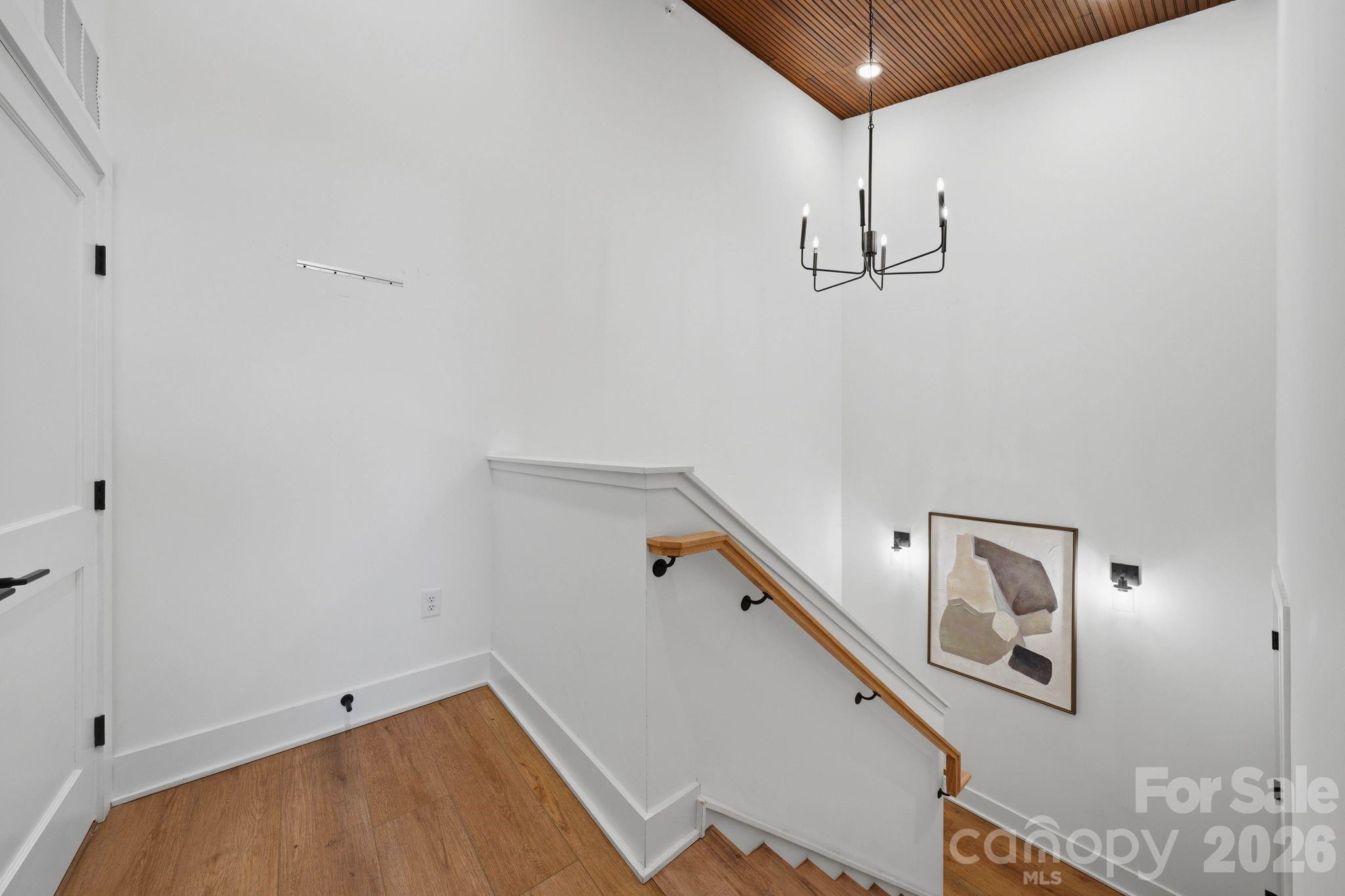 201 Grandin Road, Unit 13 Charlotte, NC 28208 - Photo 16 of 46 a hallway with stairs