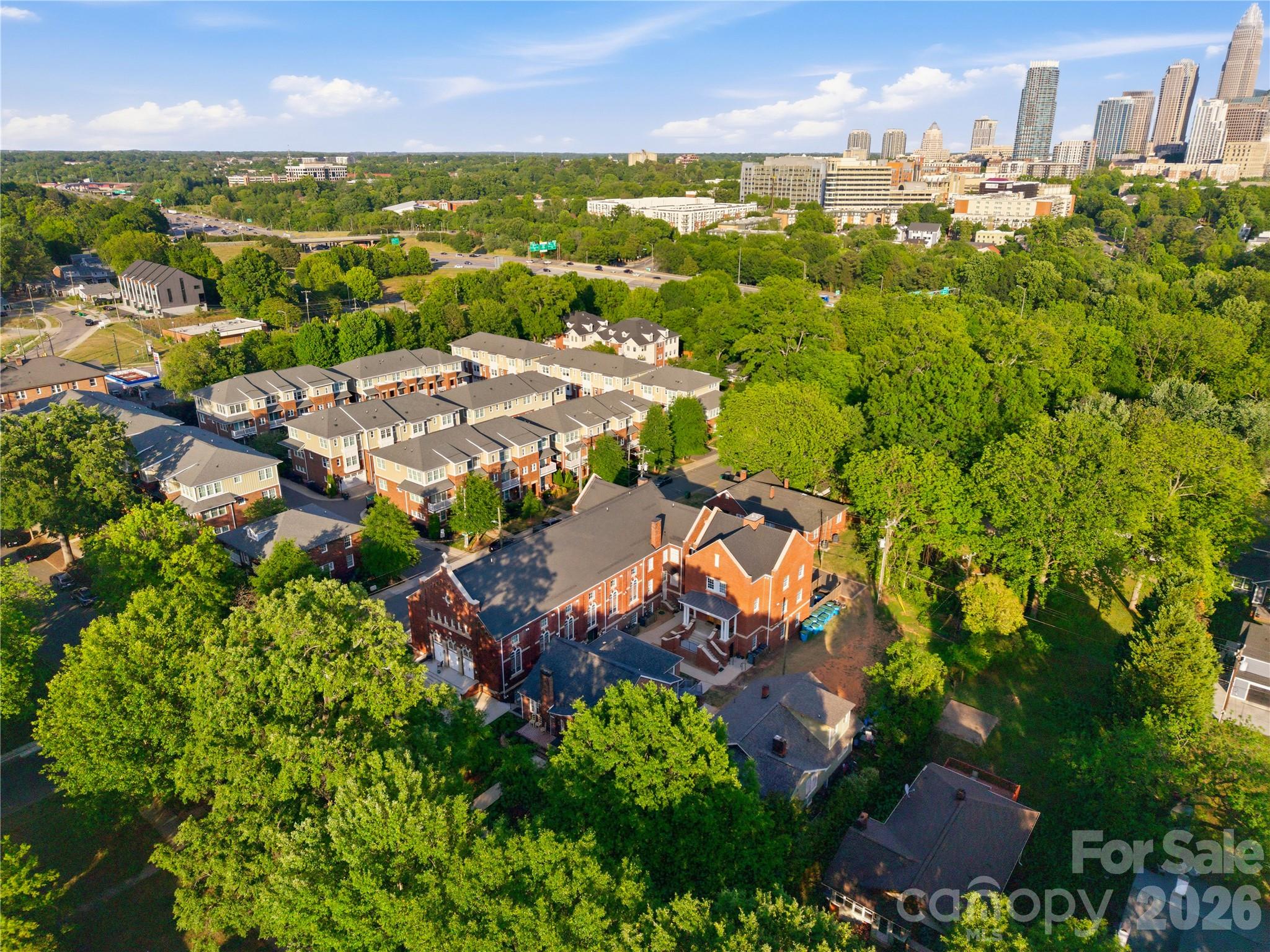 201 Grandin Road, Unit 13 Charlotte, NC 28208 - Photo 33 of 46 an aerial view of residential houses with outdoor space