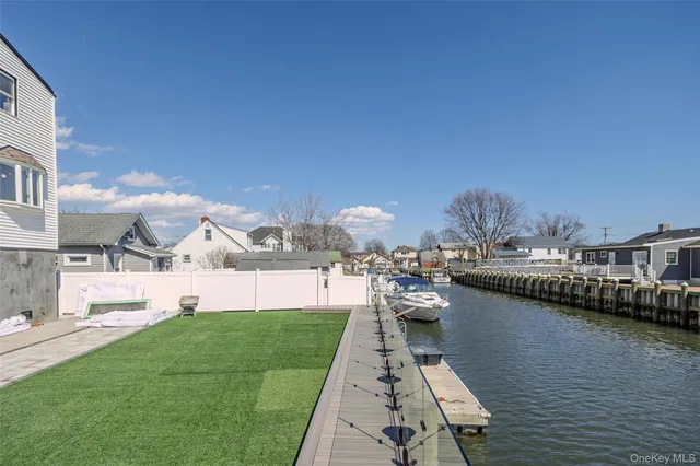 a picture of city view with lake view and boat