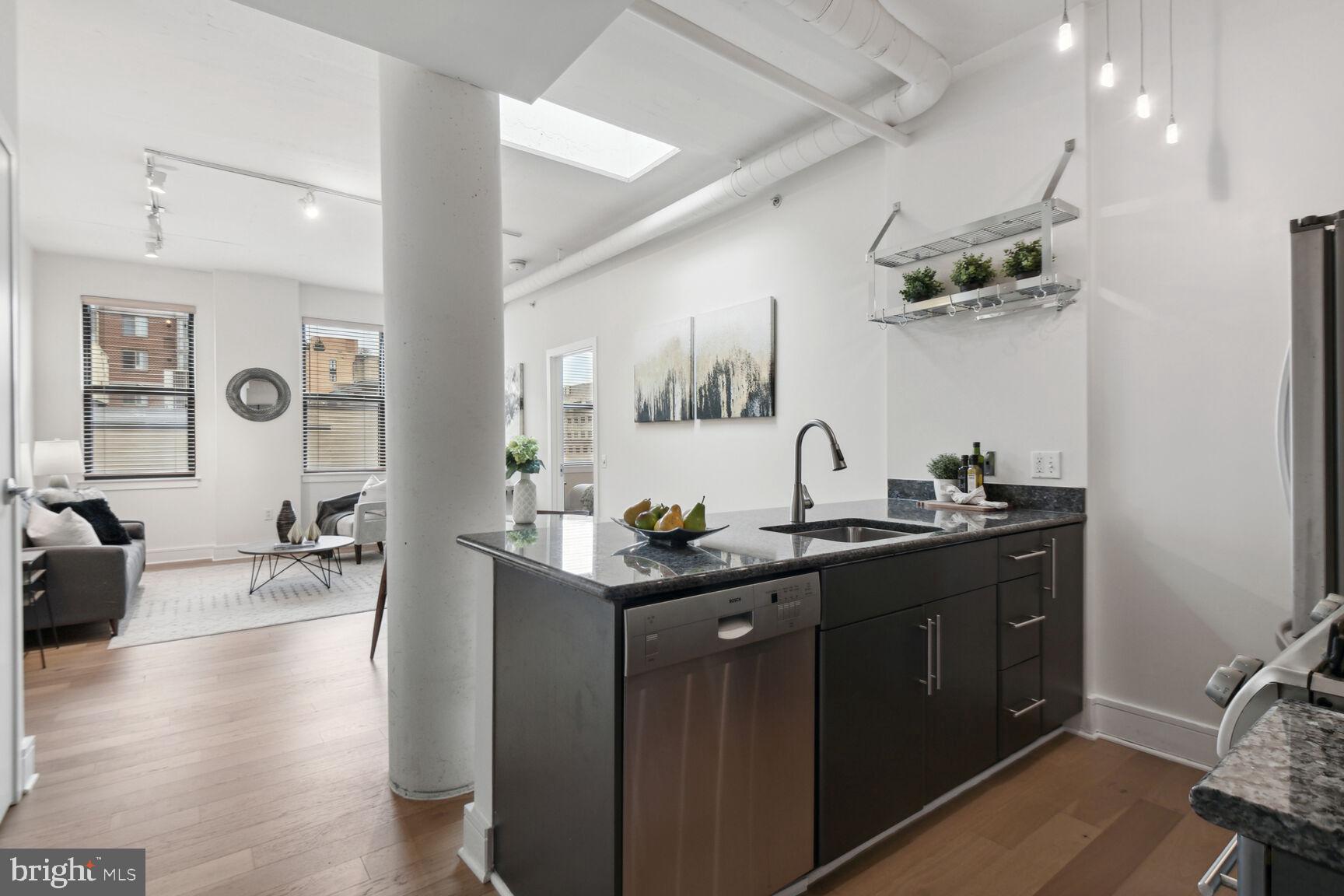 809 6th Street Northwest, Unit 65 Washington, DC 20001 - Photo 8 of 21 a kitchen with a sink and cabinets