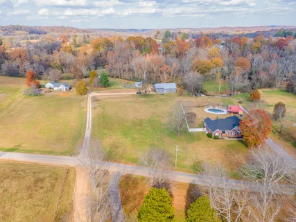 a view of swimming pool with an outdoor seating