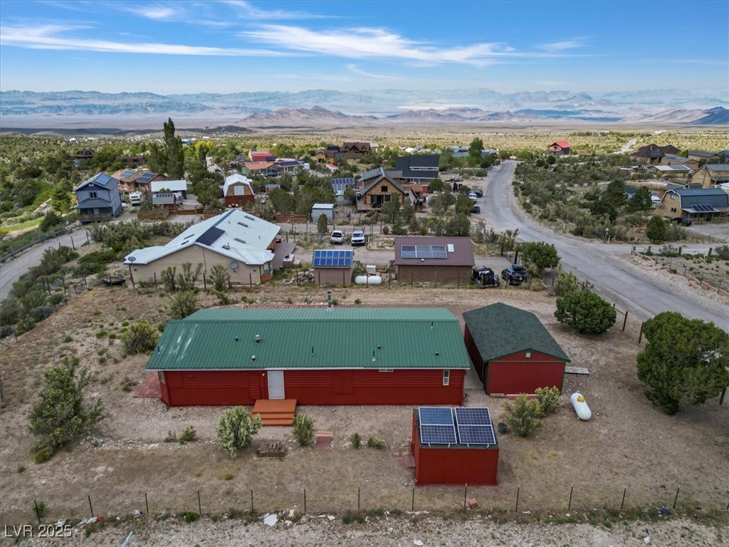 70 West Bonanza Road Las Vegas, NV 89124 - Photo 51 of 71 Aerial perspective of suburban area featuring a mountain backdrop