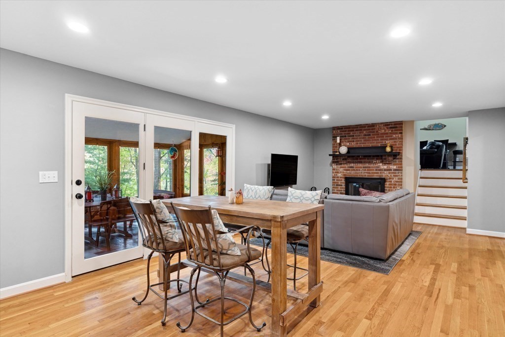 10 Fieldstone Way Boxford, MA 01921 - Photo 14 of 42 a view of a dining room with furniture window and wooden floor