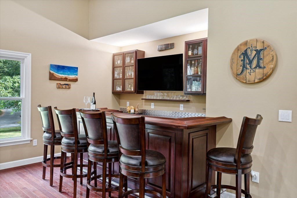 10 Fieldstone Way Boxford, MA 01921 - Photo 17 of 42 a view of a dining room with furniture and wooden floor