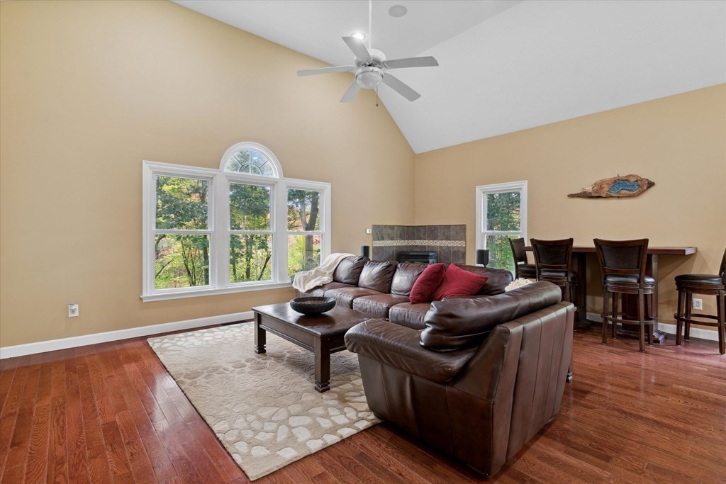 10 Fieldstone Way Boxford, MA 01921 - Photo 20 of 42 a living room with furniture and a large window