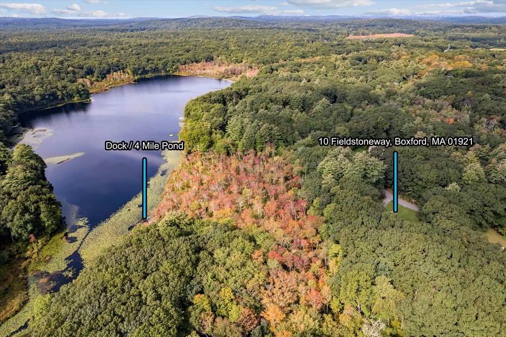 10 Fieldstone Way Boxford, MA 01921 - Photo 40 of 42 a view of a lake with a mountain in the background