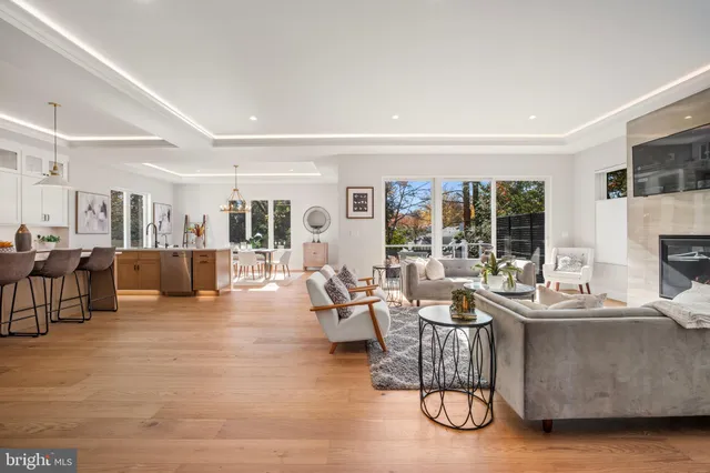 a large kitchen with stainless steel appliances lots of counter top space