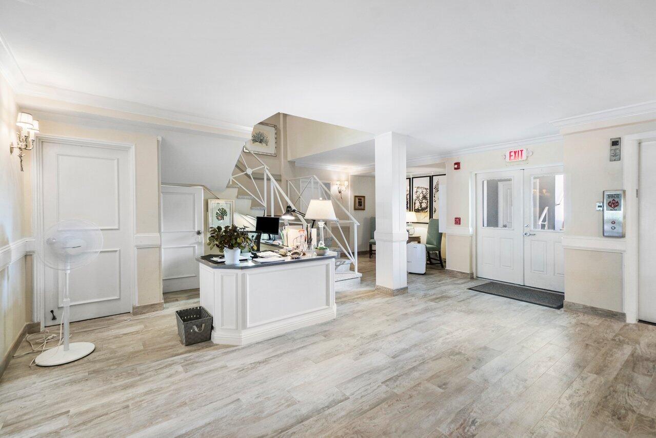 2665 North Ocean Boulevard, Unit 3 Gulf Stream, FL 33483 - Photo 35 of 50 a view of a kitchen with wooden floor
