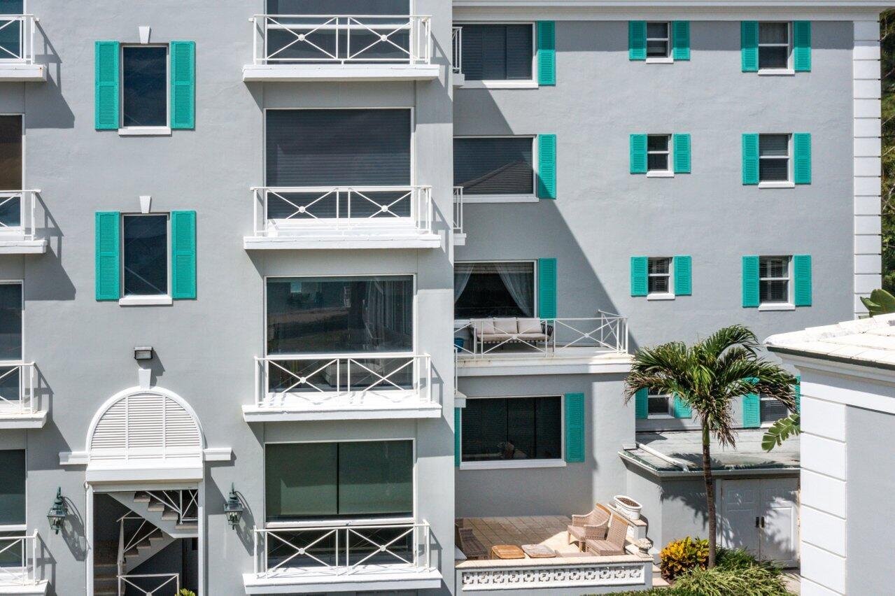 2665 North Ocean Boulevard, Unit 3 Gulf Stream, FL 33483 - Photo 43 of 50 a view of building with outdoor seating space