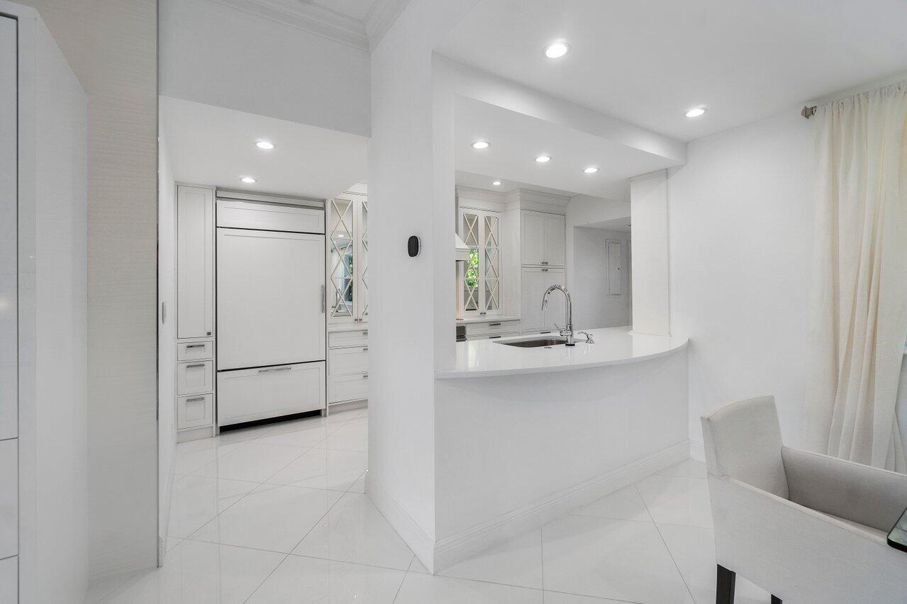 2665 North Ocean Boulevard, Unit 3 Gulf Stream, FL 33483 - Photo 9 of 50 a view of a kitchen with electric appliances