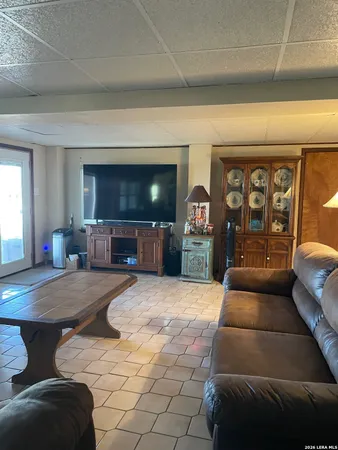 a kitchen with stainless steel appliances granite countertop a stove and a sink