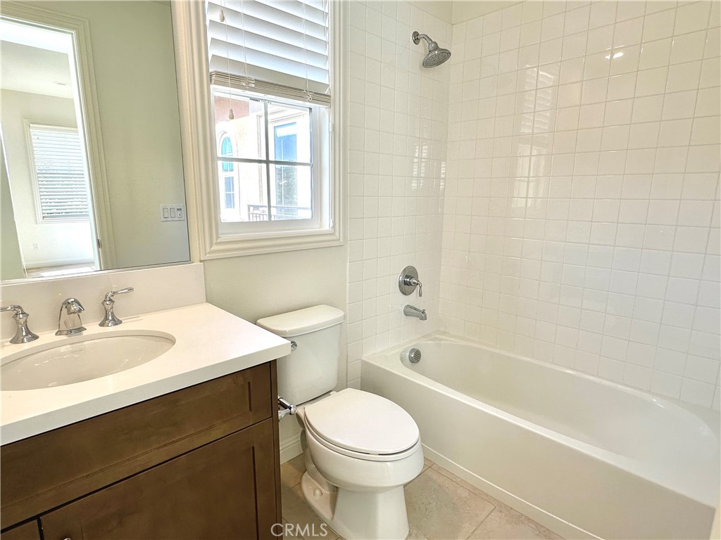 158 Bryce Run Lake Forest, CA 92630 - Photo 24 of 27 a bathroom with a sink a toilet and a bathtub