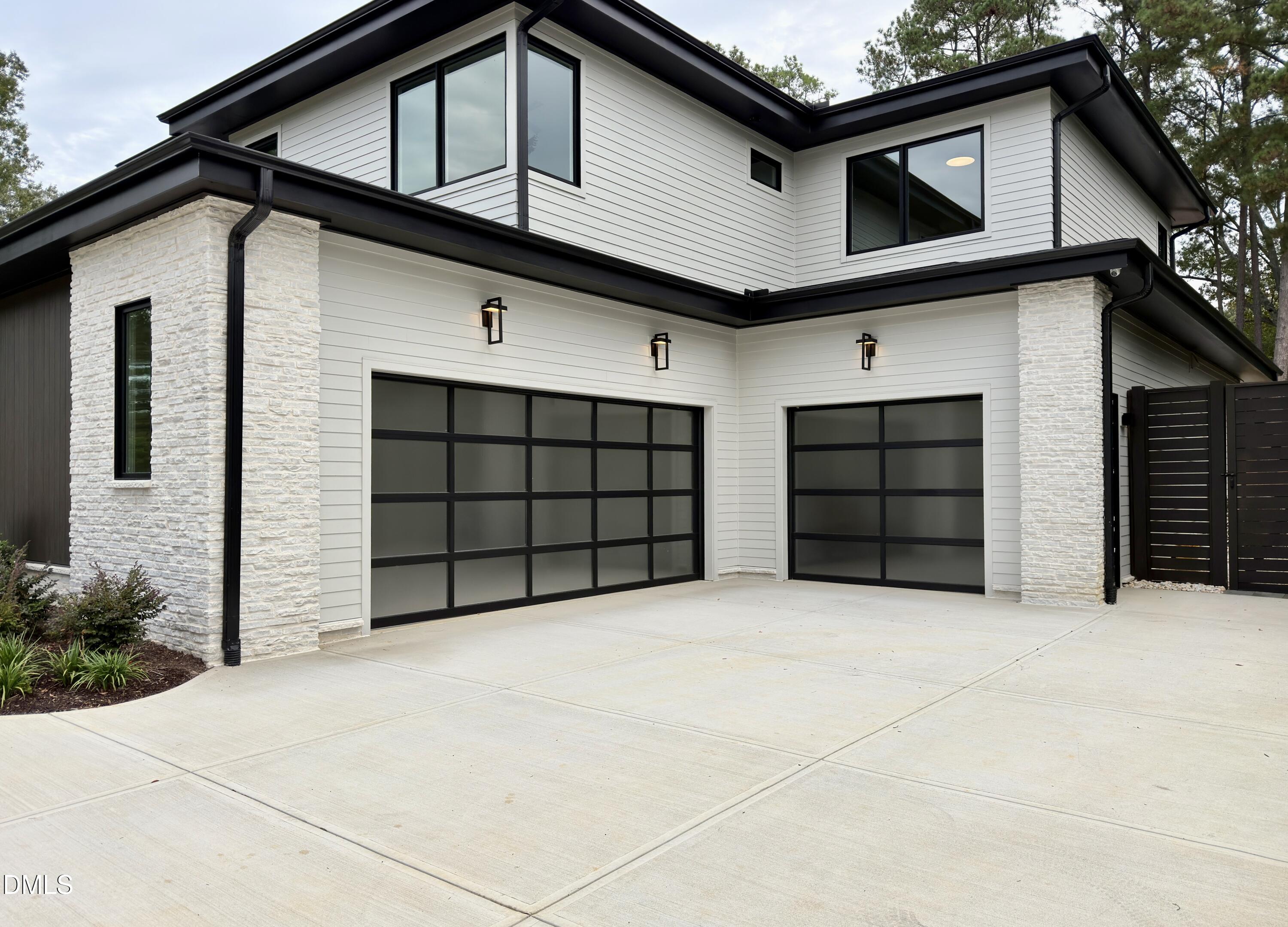 662 Manchester Drive Raleigh, NC 27609 - Photo 46 of 46 a front view of a house with a garage