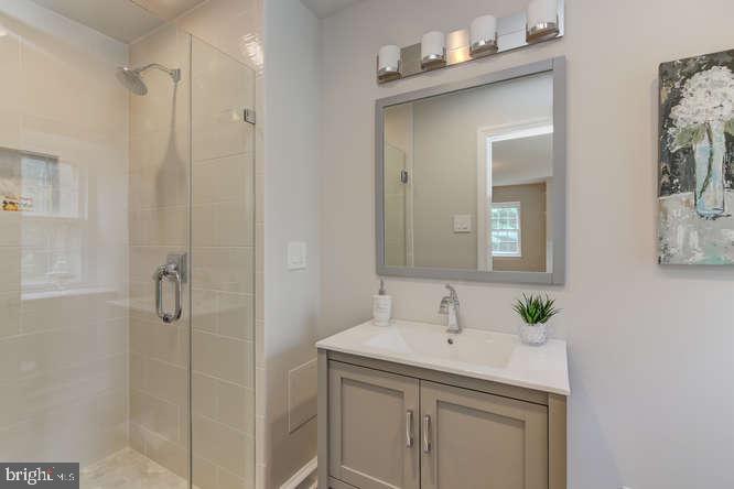 110 Guernsey Road Swarthmore, PA 19081 - Photo 26 of 34 Newly renovated Bath with frameless stall shower