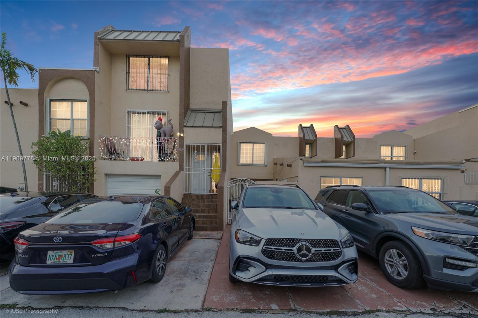 a car parked in front of a house