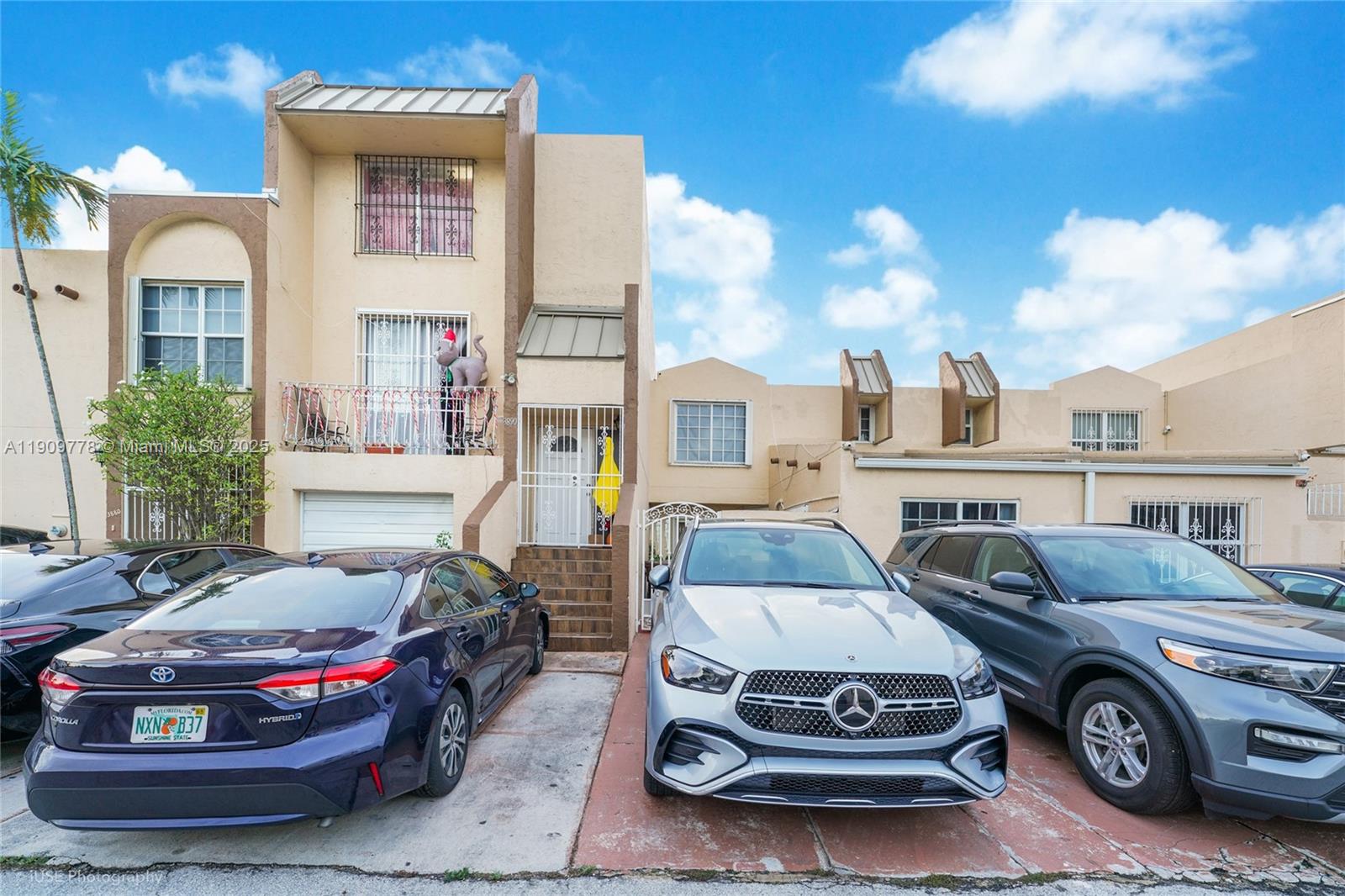 3900 West 11 Avenue, Unit 55 Hialeah, FL 33012 - Photo 12 of 12 a car parked in front of a house