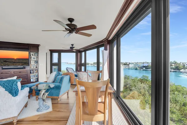 a bedroom with furniture and a flat screen tv