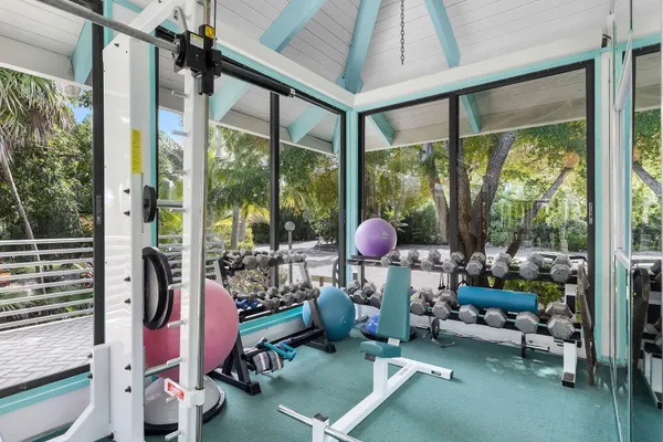 a view of a swimming pool with an outdoor seating