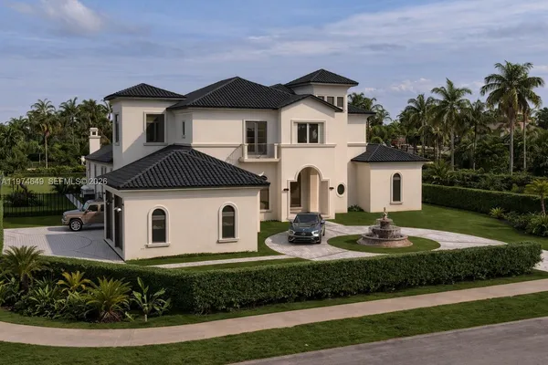 a view of a yard in front view of a house