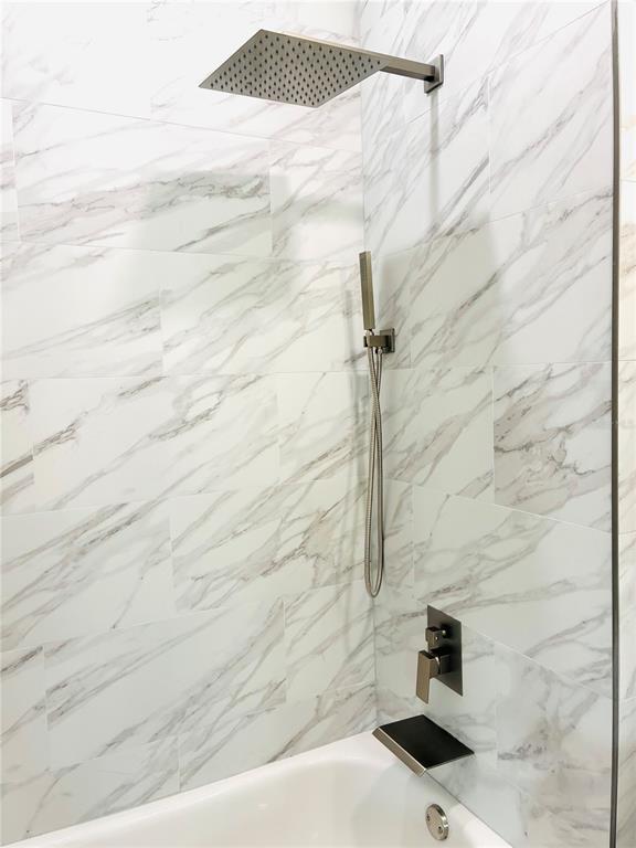 98 Wheatfield Drive, Unit B Palm Coast, FL 32164 - Photo 13 of 21 a bathroom with a shower