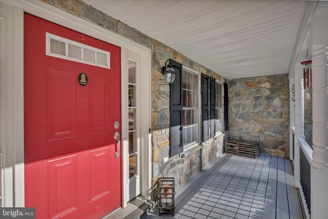 a balcony view with a large window and outdoor space