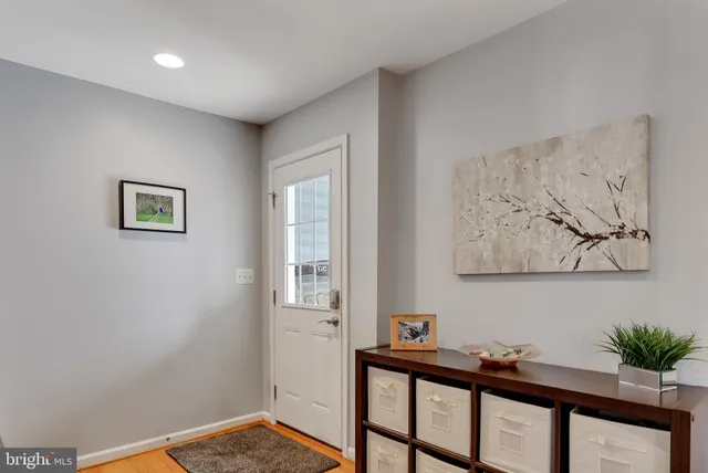 a bathroom with a granite countertop sink a mirror and a window
