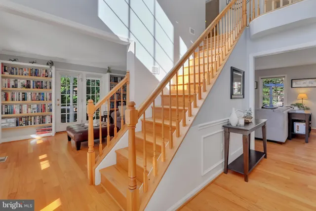 a bath tub sitting in a bathroom next to a window