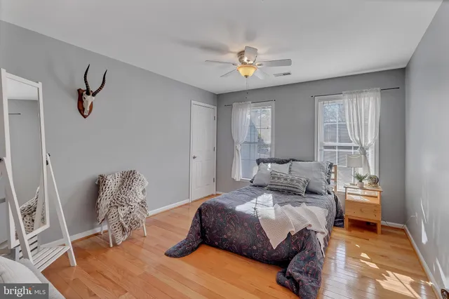 a view of livingroom with hardwood floor and cabinet