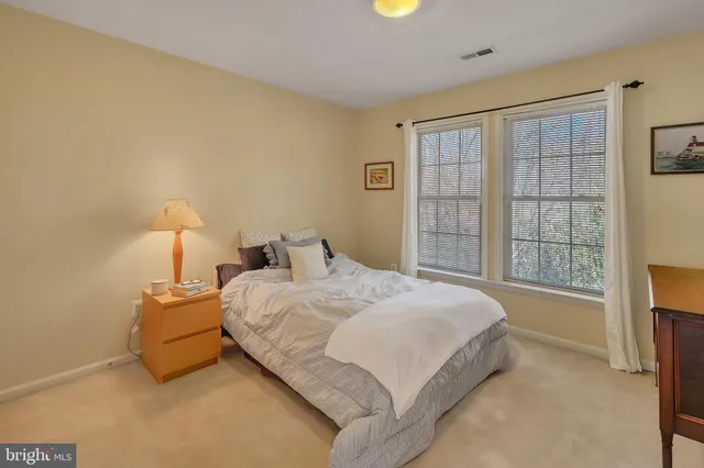 a view of a house with a tree