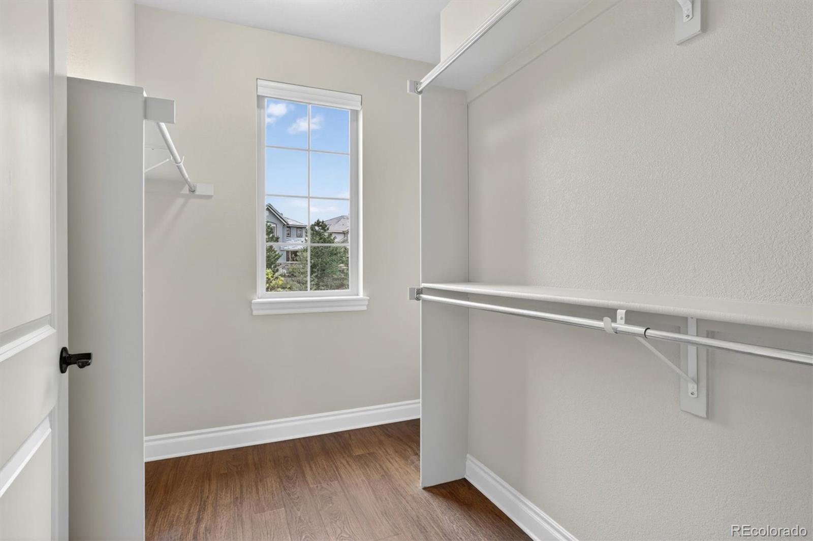 10126 RidgeGate Circle Lone Tree, CO 80124 - Photo 22 of 32 a view of an empty walk in closet