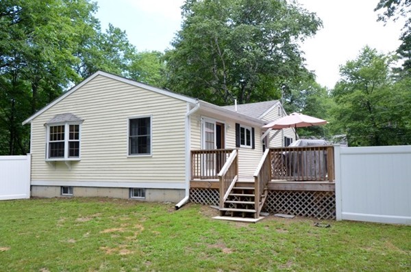 50 Beaman Road Sterling, MA 01564 - Photo 12 of 13 a front view of a house with a yard