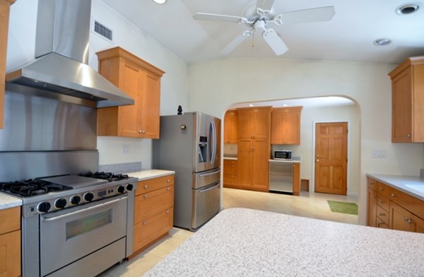 50 Beaman Road Sterling, MA 01564 - Photo 2 of 13 a kitchen with stainless steel appliances a stove a refrigerator and a sink
