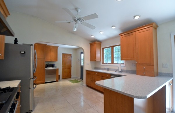 50 Beaman Road Sterling, MA 01564 - Photo 3 of 13 a large kitchen with kitchen island a sink stainless steel appliances and cabinets