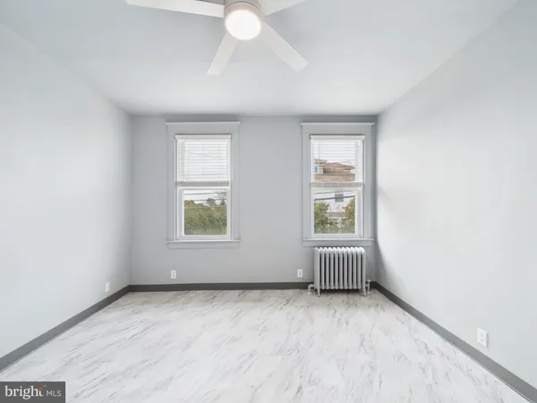 an empty room with windows