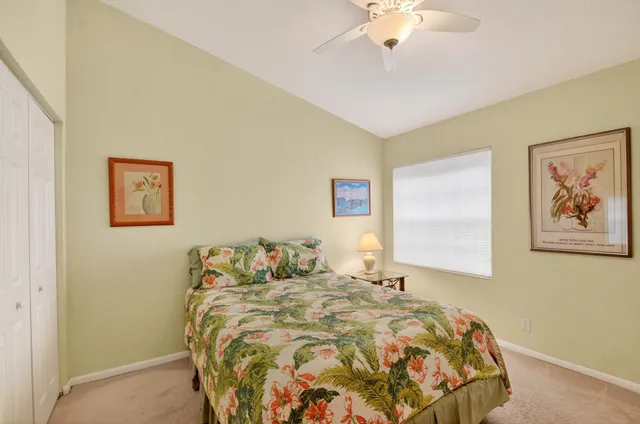 a view of a swimming pool with sitting area