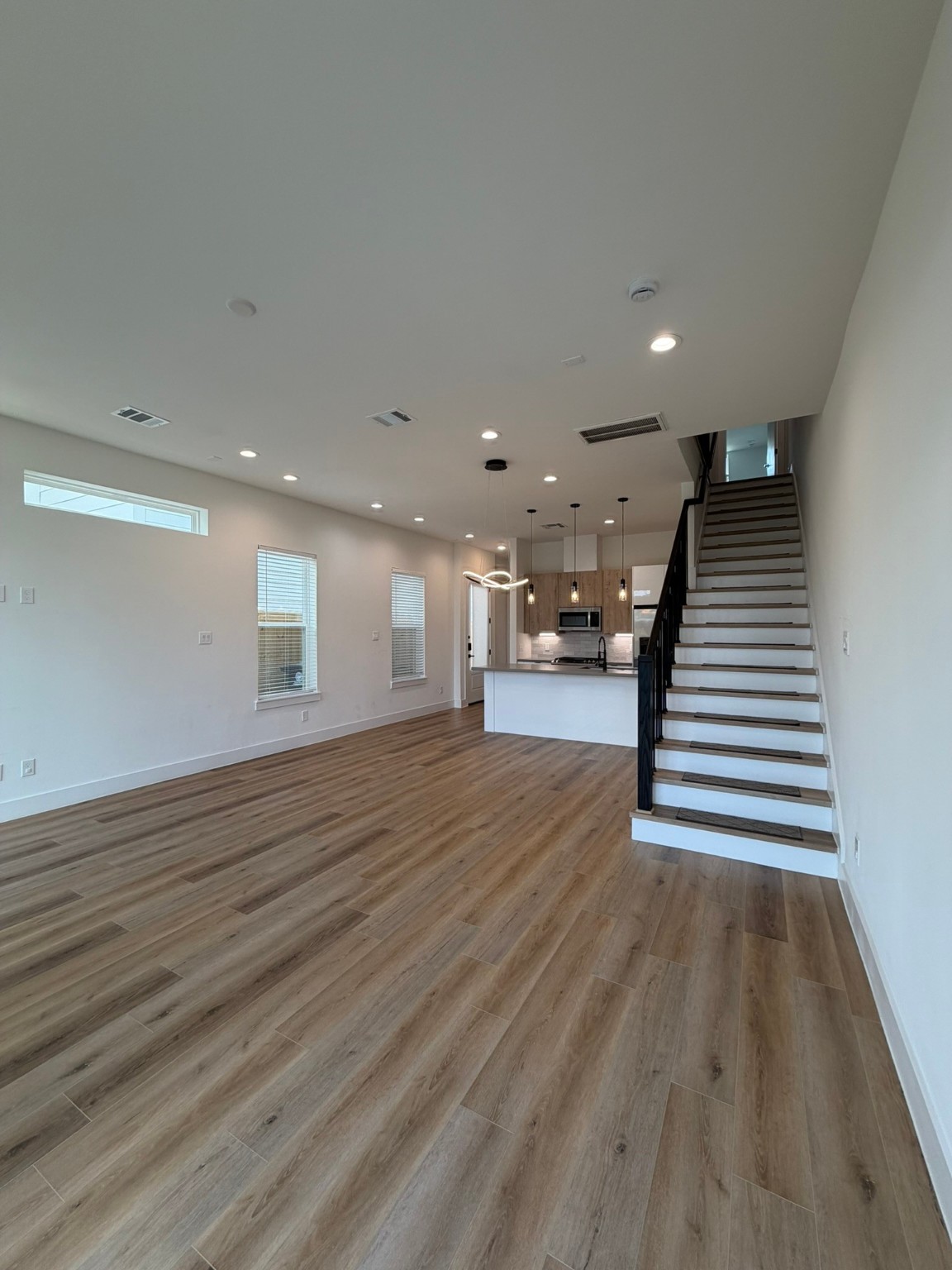 6733 Peerless Street Houston, TX 77021 - Photo 7 of 22 a view of a room with wooden floor
