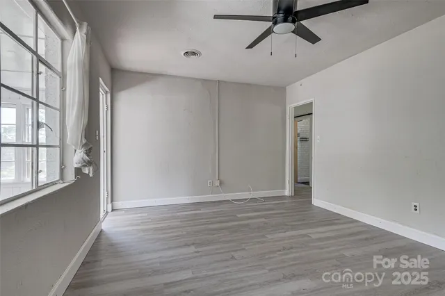 an empty room with windows