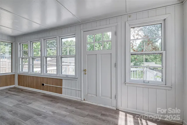 a bathroom with a sink mirror and toilet