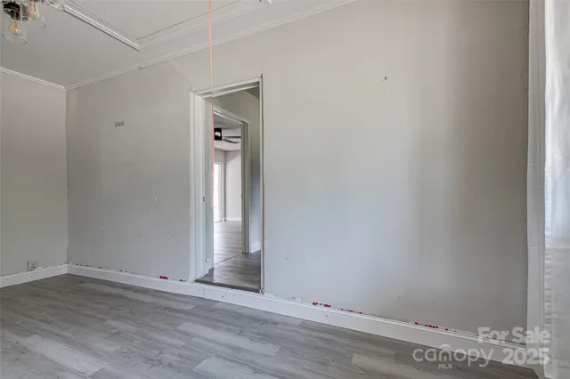 a utility room with cabinets washer and dryer