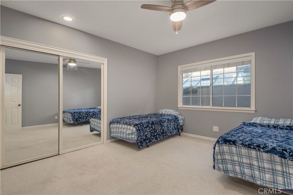 2201 Agnes Road Manhattan Beach, CA 90266 - Photo 17 of 36 a living room with a couch and chandelier