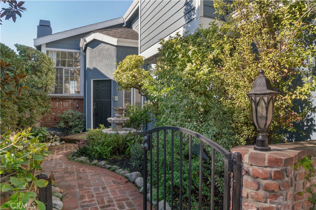 2201 Agnes Road Manhattan Beach, CA 90266 - Photo 2 of 36 a couple of flower plants in front of house