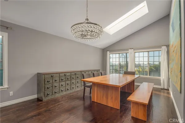 a room with gym equipment and a large window