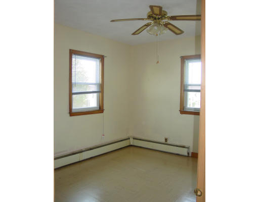 45 Guild Street Hull, MA 02045 - Photo 8 of 10 a view of an empty room with a window