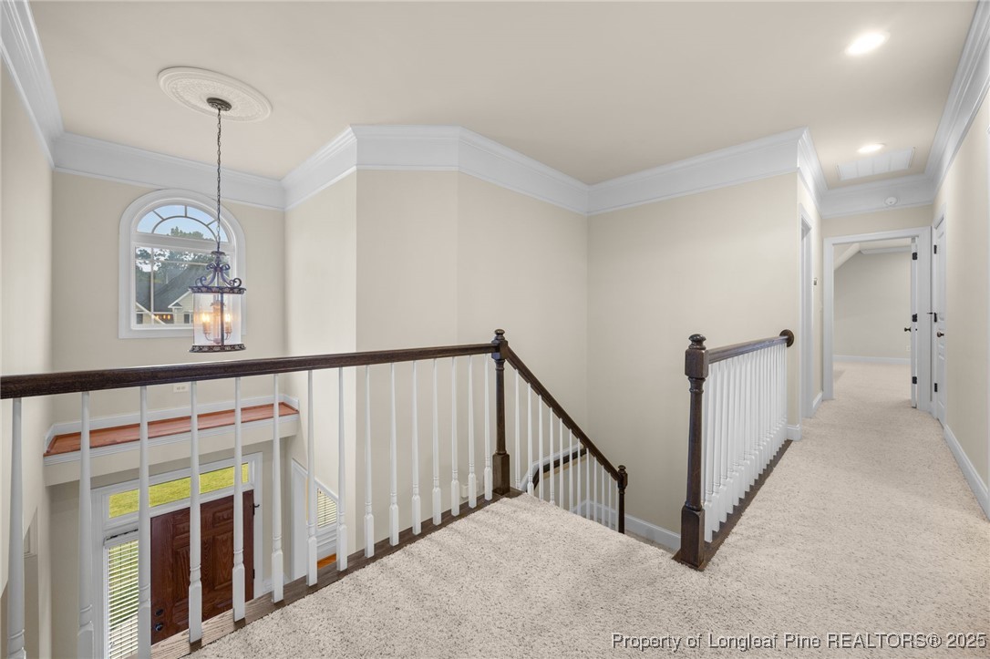 335 Lancelot Court Linden, NC 28356 - Photo 21 of 50 a view of a hallway with windows